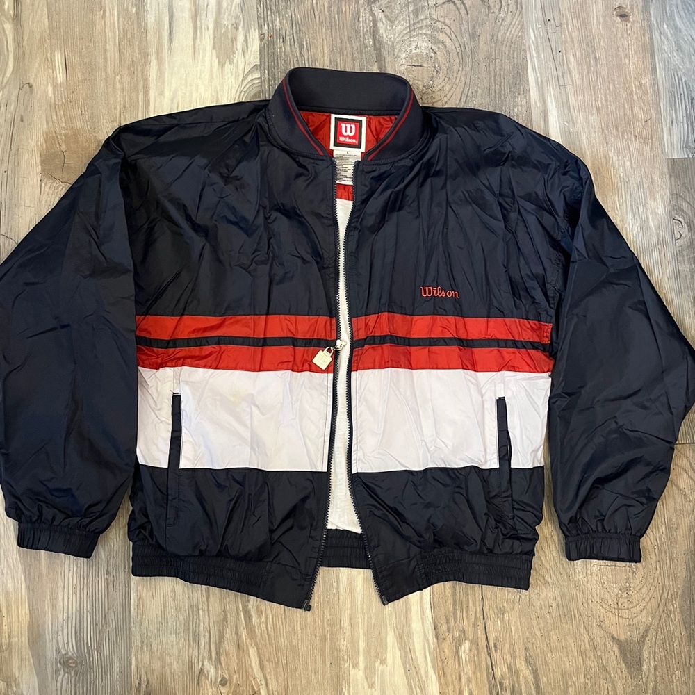 vintage red white and blue windbreaker by wilson tagged size L